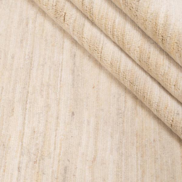 Nærmere kig på tæppet i lys farve