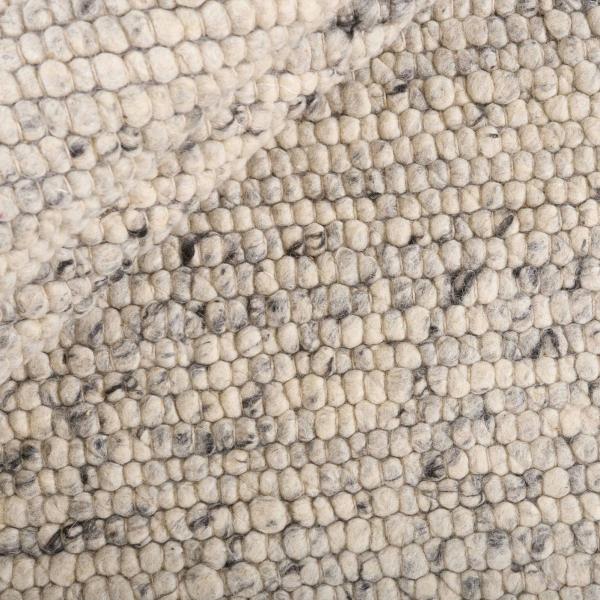 Texura Hilly tæppe lavet af naturbehandlet fåreuld med markant noppenstruktur.