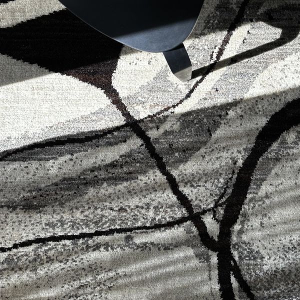 Close-up of the exclusive Berber rug, designed by Ela.