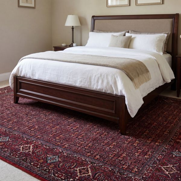 Hand-knotted Persian rug in burgundy with a floral pattern