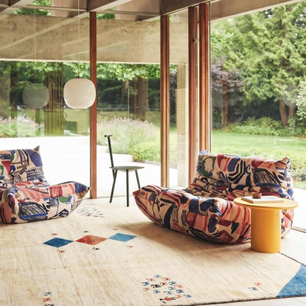 Bright living room with a minimalist Gabbeh rug