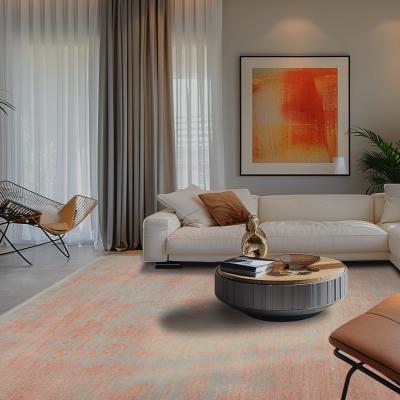 Stue i Clean Living stil med pastelfarvet tæppe