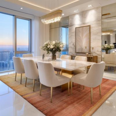 Modern szőnyeg az étkezőasztal alatt egy elegáns étkezőben