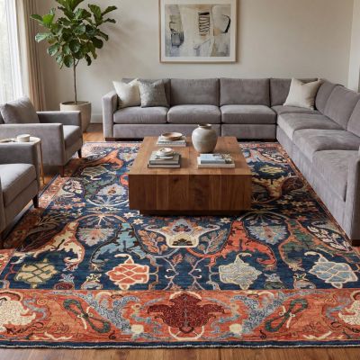 Multicolor Orientteppich im Wohnzimmer mit grauem Ecksofa und Holztisch