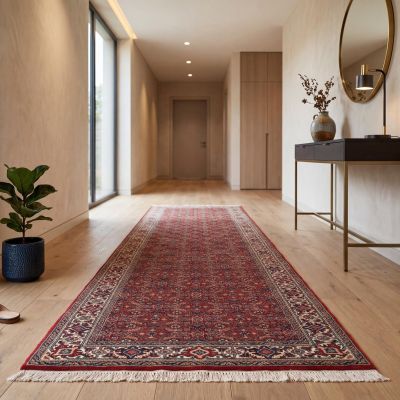 Red Persian runner rug in a bright, modern hallway
