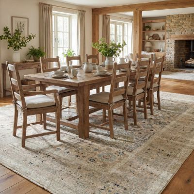 Hand-knotted vintage rug in a farmhouse-style dining room