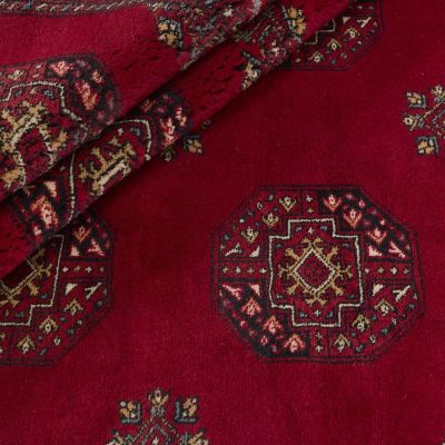Pakistan Bokhara rug in red with traditional Turkmen Göl patterns