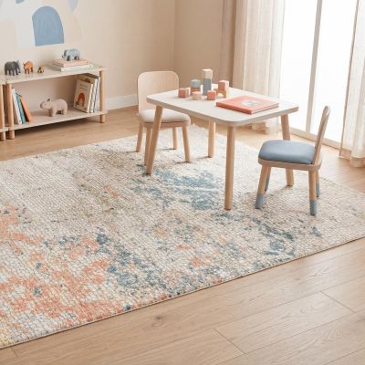 Colourful children's room with a vibrant patchwork play mat
