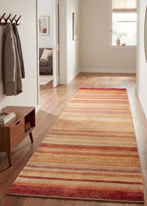 A designer runner rug in a modern hallway with an elegant and contemporary interior style