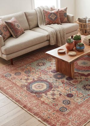 Salon bohème avec tapis d'Orient noué main