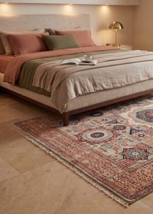 Hand-knotted Ziegler rug in the bedroom with a classic pattern