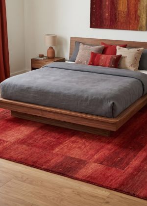 Plain-coloured rugs in red and orange