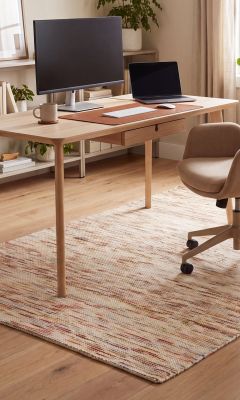Modern designer rug in the home office with a subtle color gradient